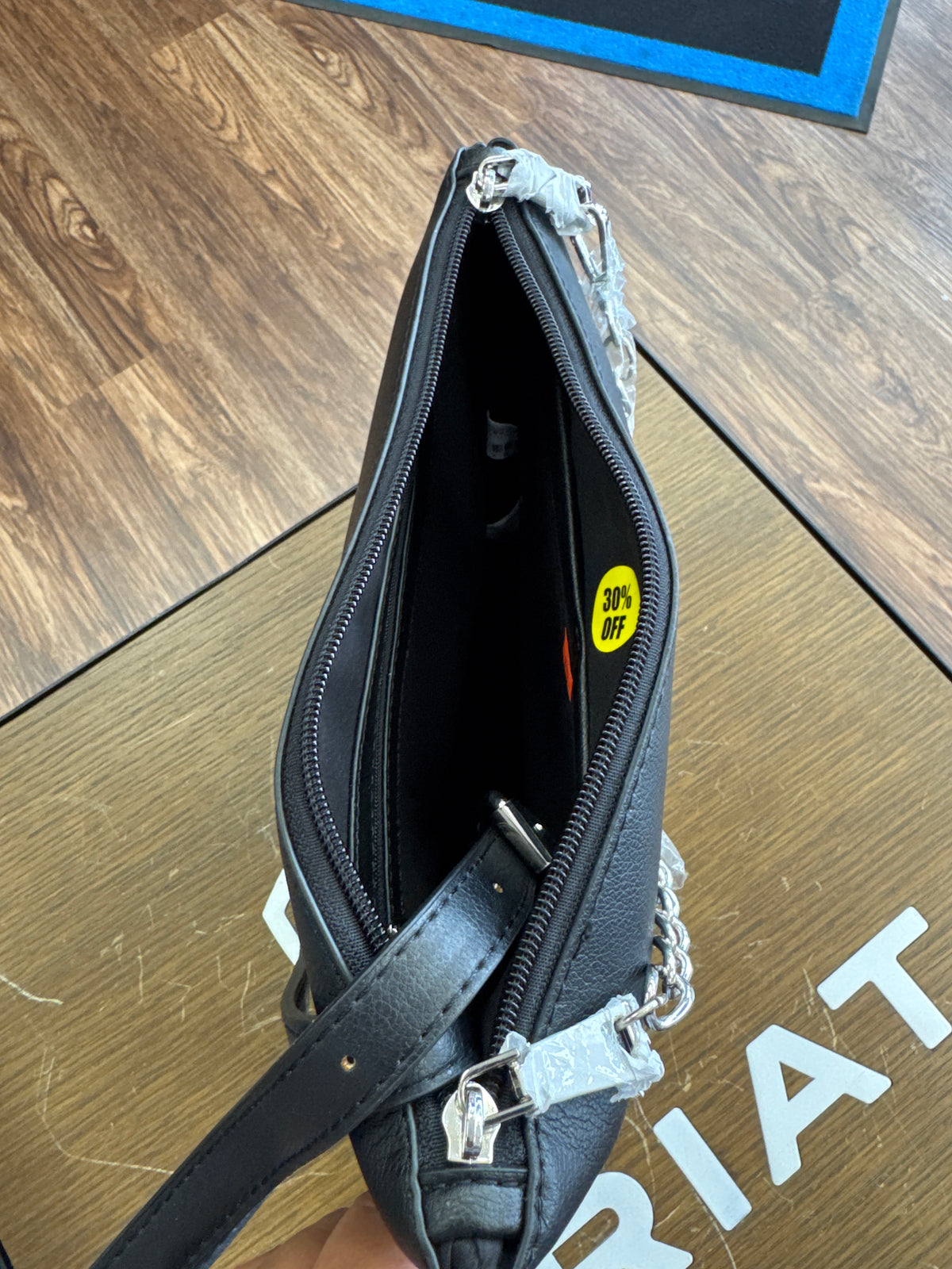 Black leather purse with silver chain