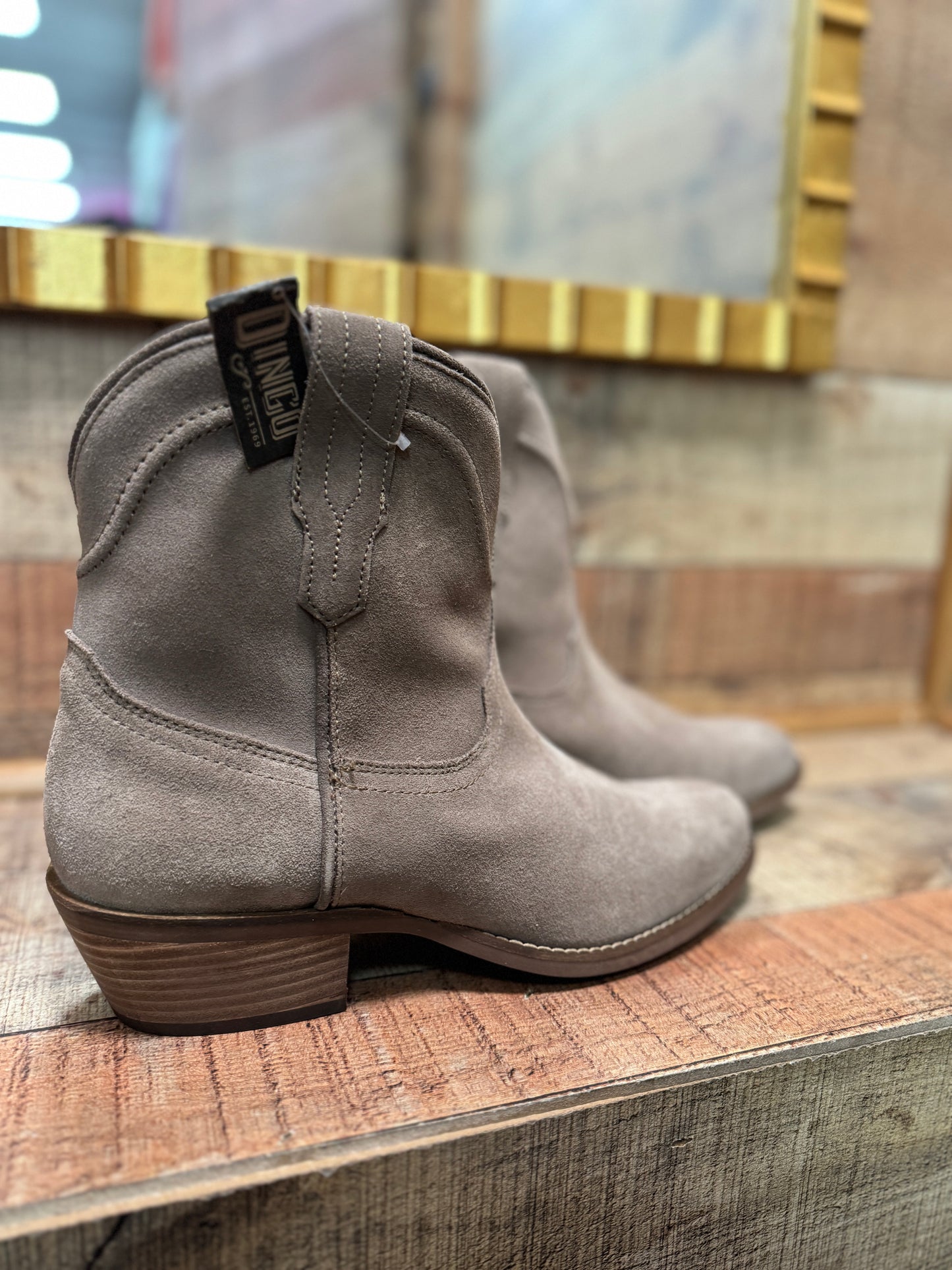 Dingo: Tumbleweed Sand Soft Suede Leather Booties
Cushioned Insole
Rubber TPR Outsole