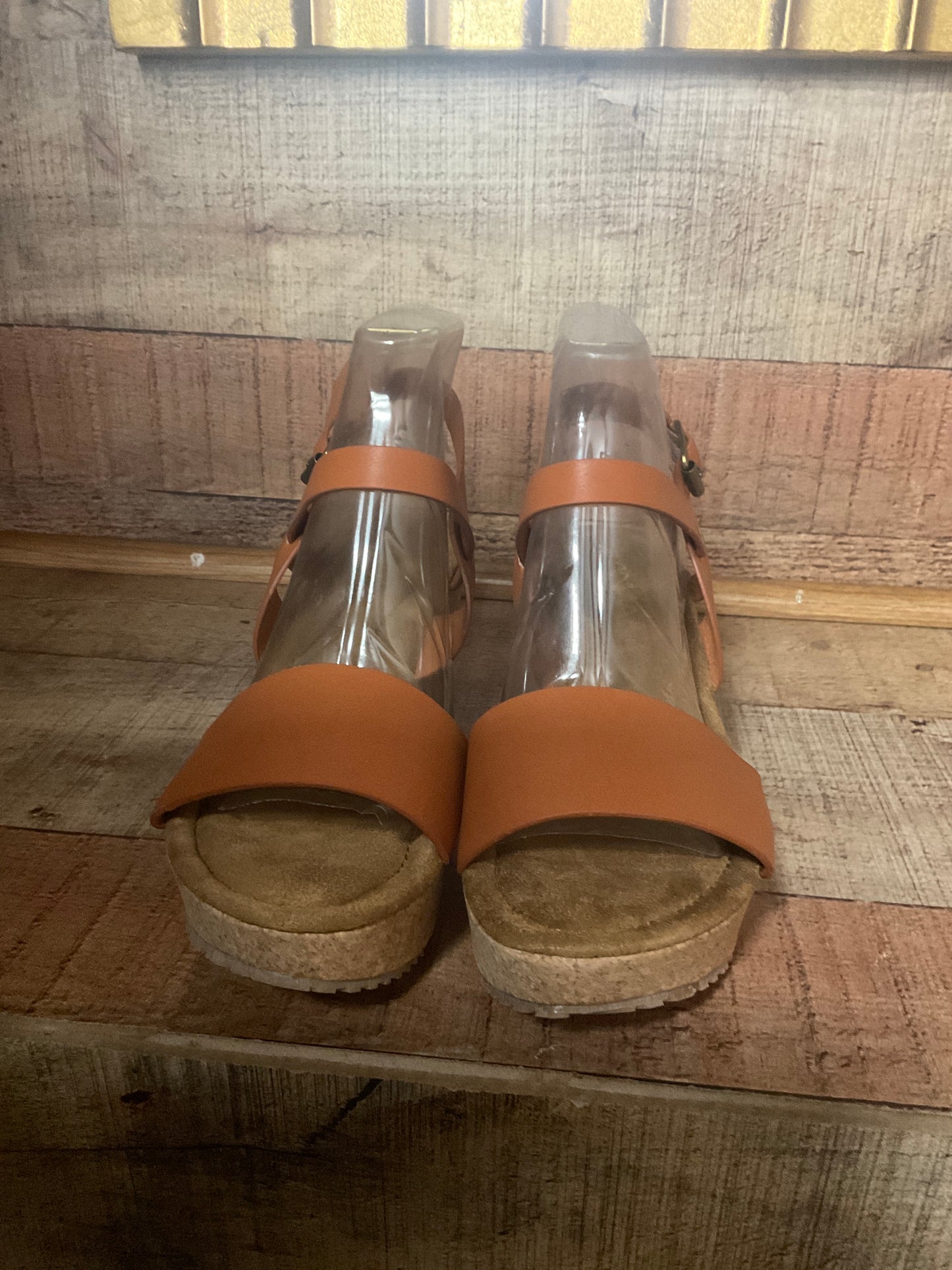 Flat brown high heel