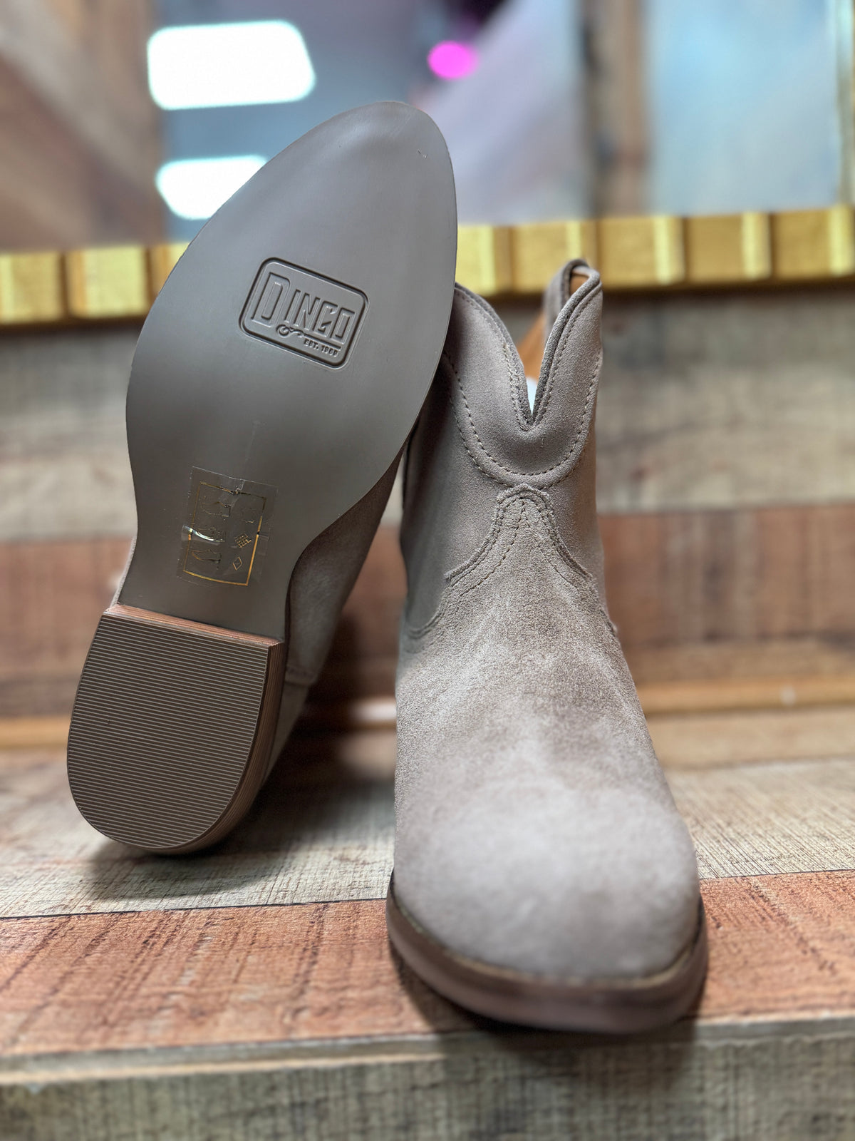 Dingo: Tumbleweed Sand Soft Suede Leather Booties
Cushioned Insole
Rubber TPR Outsole